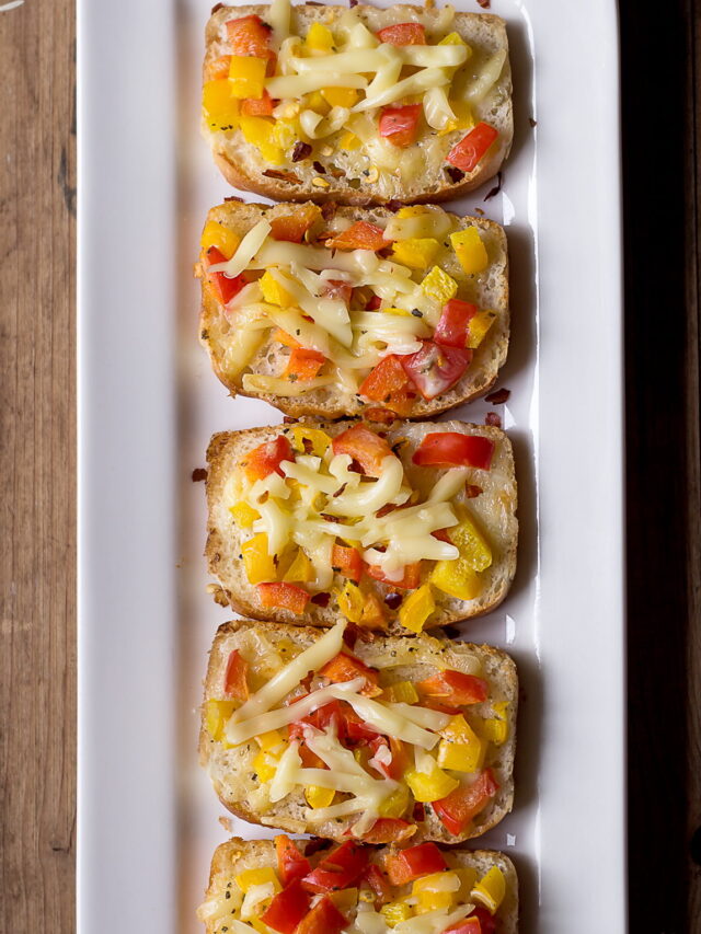 Close-up of golden-brown Garlic Chilli Cheese Toast fresh out of the oven