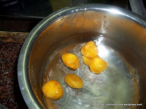 Close-up of soft mangodis soaked in flavorful gravy