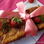 Freshly baked strawberry pound cake loaf with a golden crust