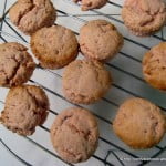 Freshly baked strawberry scones with a golden crust on a cooling rack