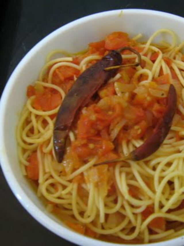 Bowl of Spaghetti Arrabiata Pasta garnished with red chillies
