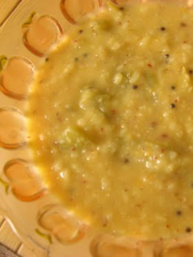 A bowl of Green Tomato Kootu garnished with fresh coriander