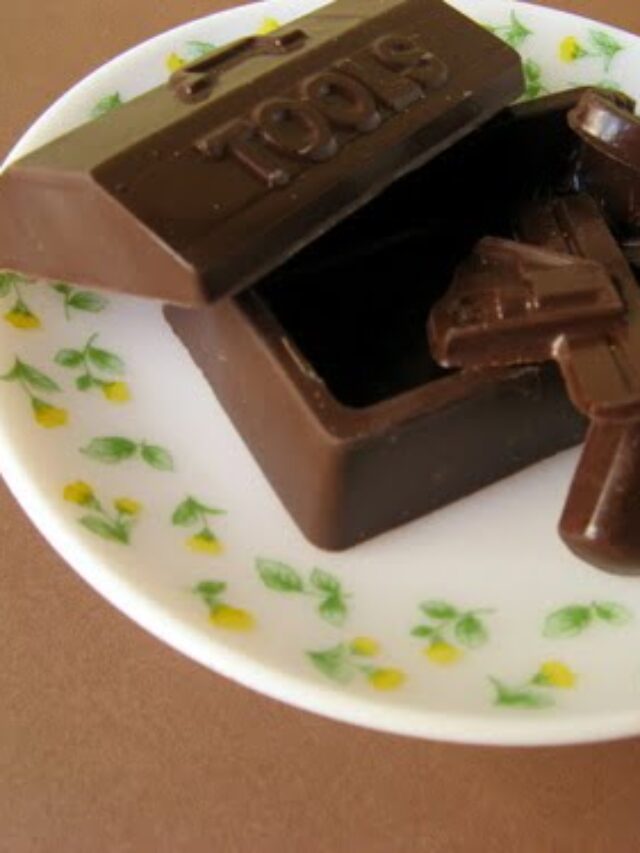 Glossy molded chocolates with a marbled chocolate finish
