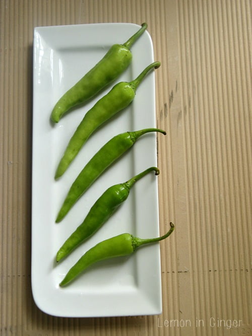 Green chillies placed in a plate, ready for making pickle