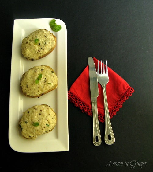 Freshly baked, golden brown twice-baked potatoes on a plate