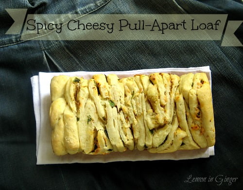 Freshly baked eggless pull apart cheese bread with golden crust