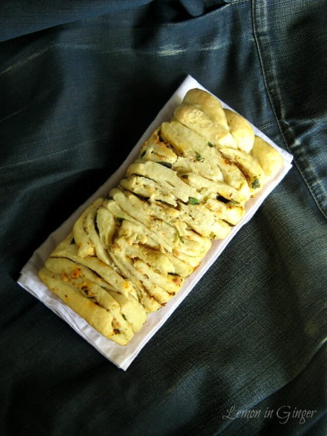 Close-up of gooey cheese inside soft pull apart bread pieces