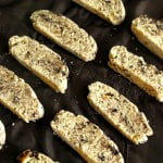 Chocolate biscotti slices showing crispy edges and ginger bits