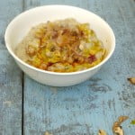 Close-up of the creamy eggplant yogurt dip with olive oil drizzle