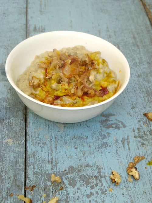 Close-up of the creamy eggplant yogurt dip with olive oil drizzle