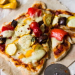 Roasted vegetable pizza with colorful toppings fresh out of the oven