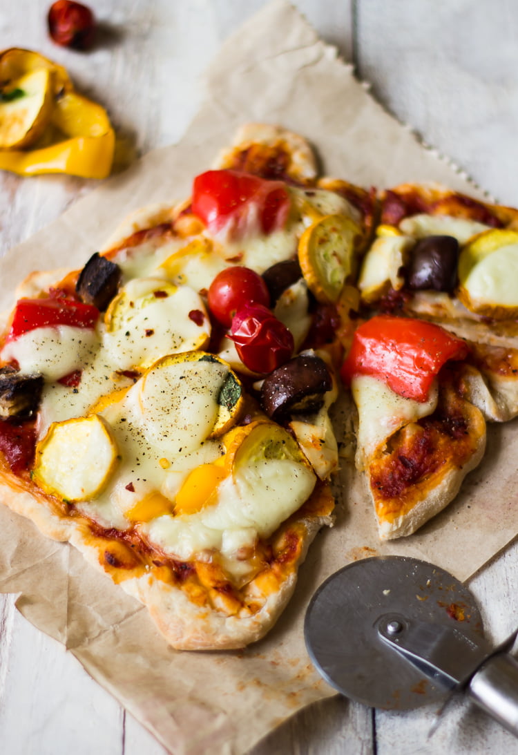 Roasted vegetable pizza with colorful toppings fresh out of the oven