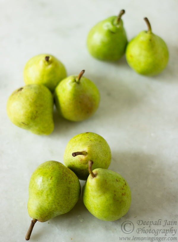 Fresh pears ready for poaching with white wine and spices