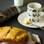 Olive bread loaf cooling on a wire rack