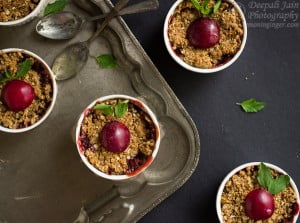 Oven-baked apple plum crumble with golden-brown crust