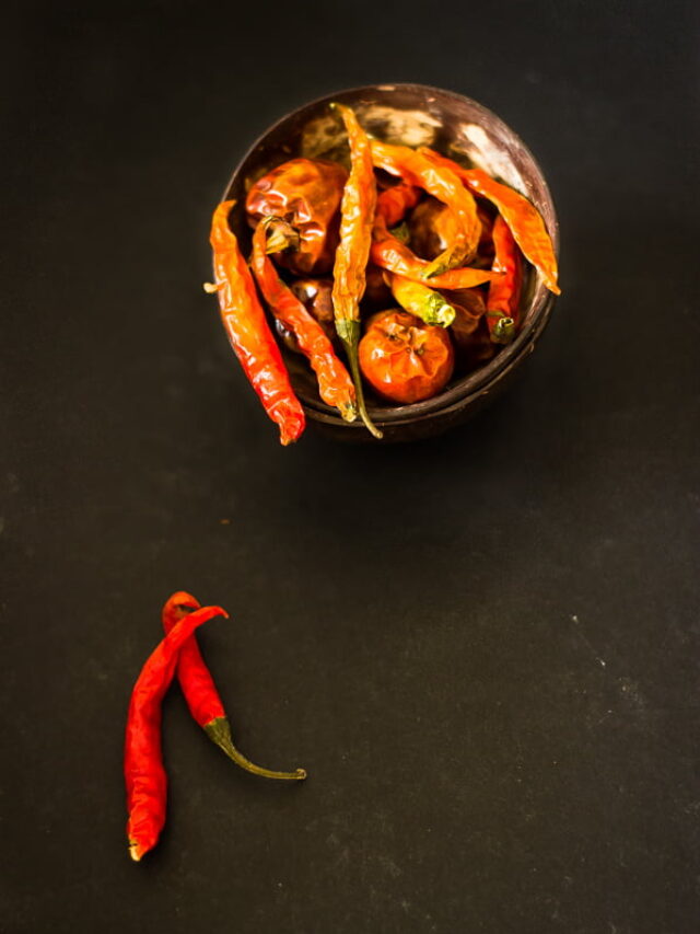 A final display of fully dried red chilies arranged neatly in a bowl