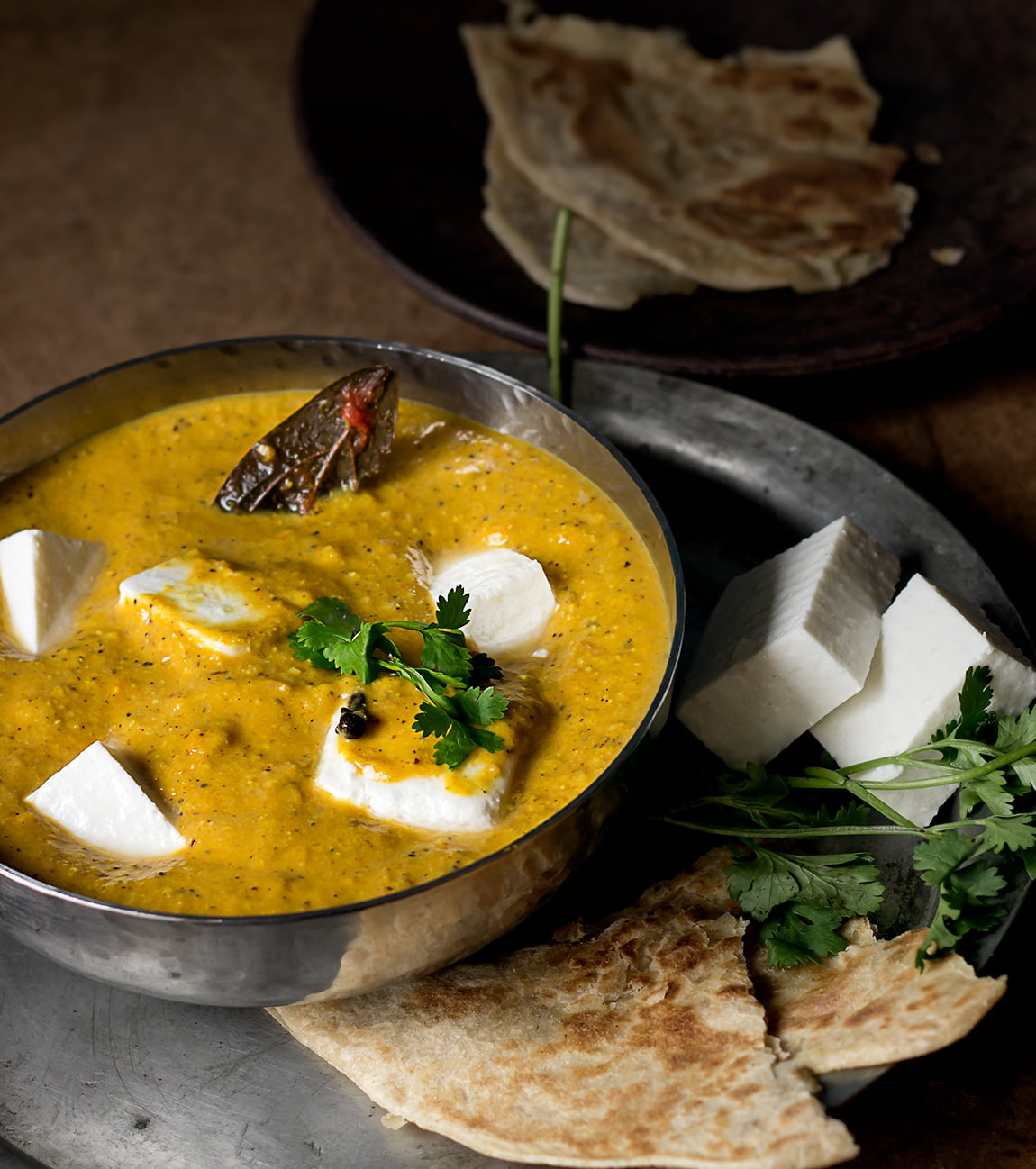  A bowl of hot and spicy Kadai Paneer served with naan