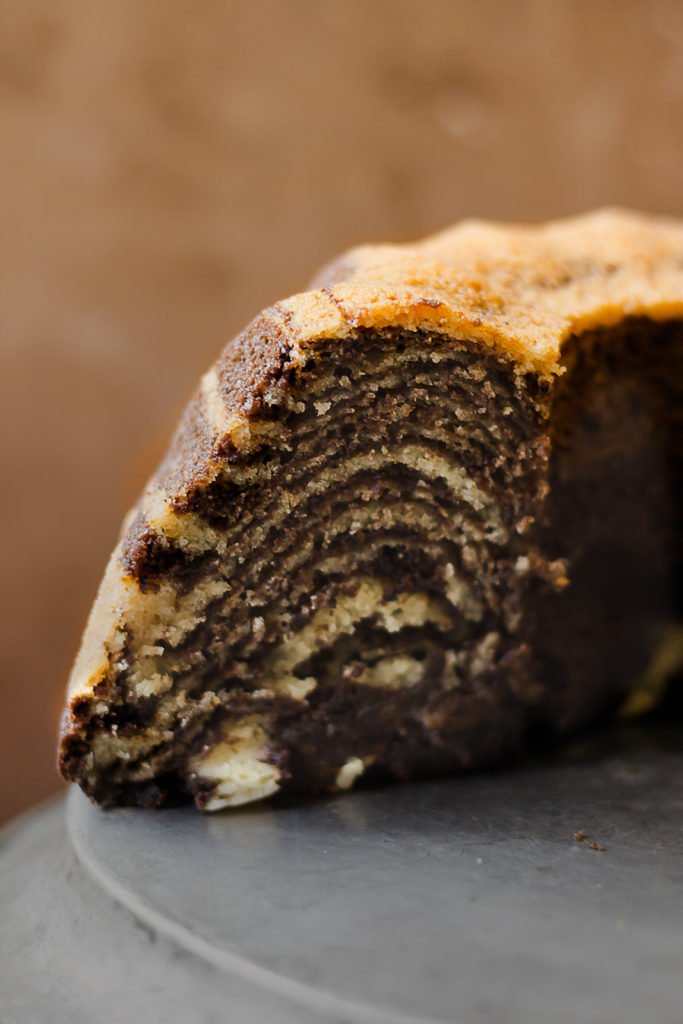 Close-up of a slice of Chocolate Zebra Cake showing its unique striped layers