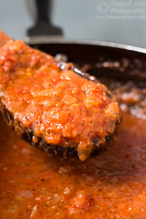 Close-up of the sauce’s rich and smooth texture in a pan