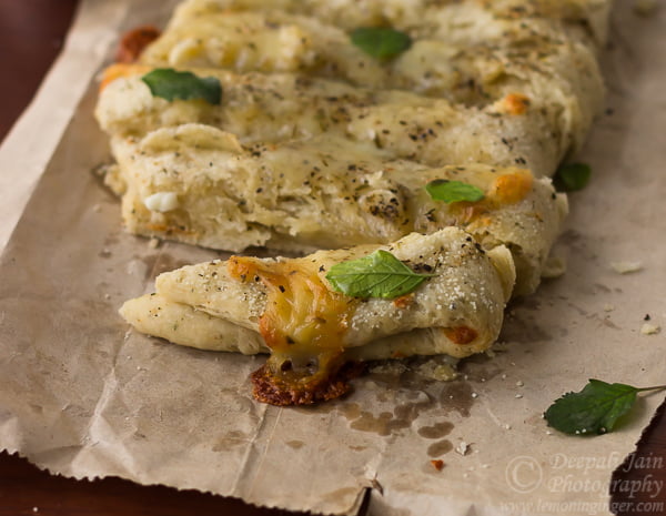 Dominos Style Cheesy breadsticks ready to serve to kids