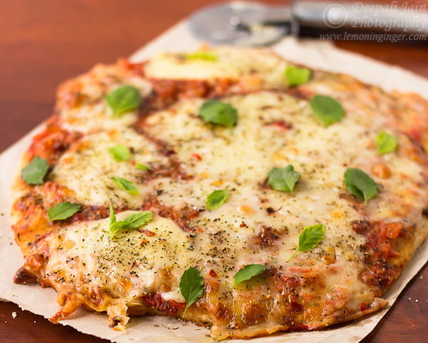 Golden-brown crust of a whole wheat pizza fresh out of the oven