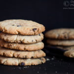 Close-up of freshly baked oatmeal chocolate chip cookies on a baking tray