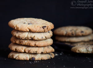 Close-up of freshly baked oatmeal chocolate chip cookies on a baking tray