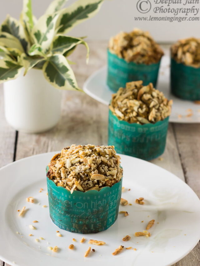 Eggless Date and Walnut Cupcakes garnished with the crushed walnuts on the top