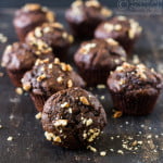 Top view of banana chocolate muffins in parchment liners