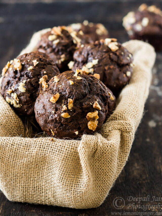 Close-up of moist chocolate banana muffin with visible banana chunks