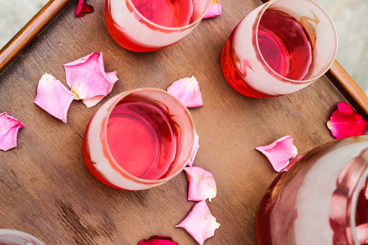 Homemade Rooh Afza Sharbat being served in clear glasses during a summer party