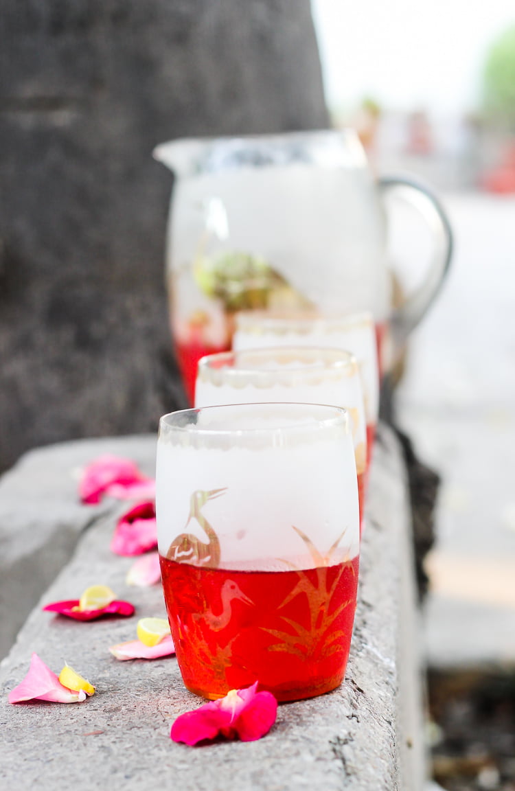 Rooh Afza Sharbat served with a side of snacks for a refreshing summer treat