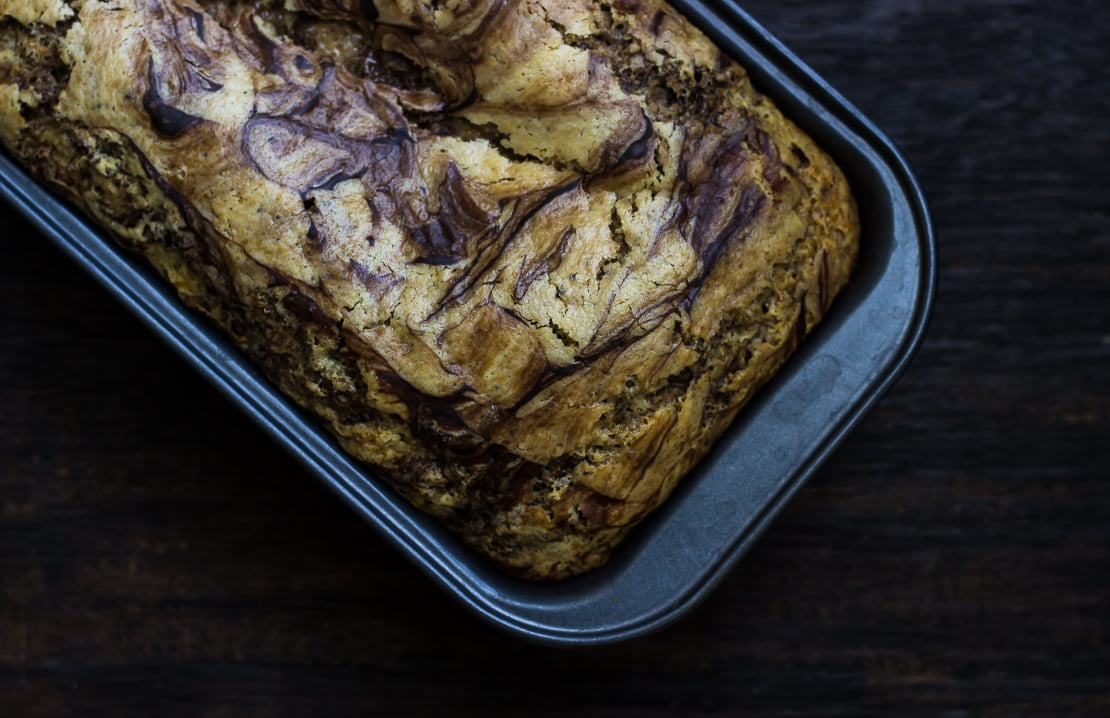 Close-up of the marbled swirl pattern on the Eggless Chocolate Vanilla Swirl Cake