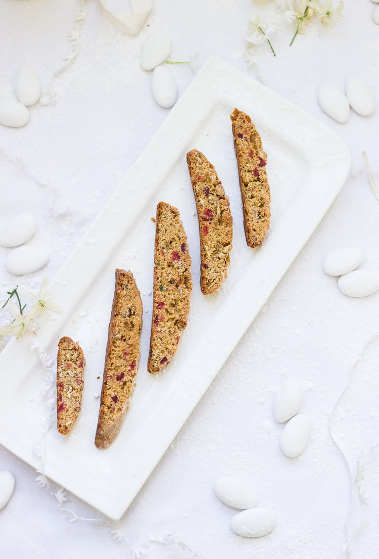 Sliced biscotti arranged on a baking tray, ready for the second bake