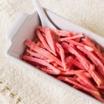 Homemade pickled ginger in a ceramic bowl