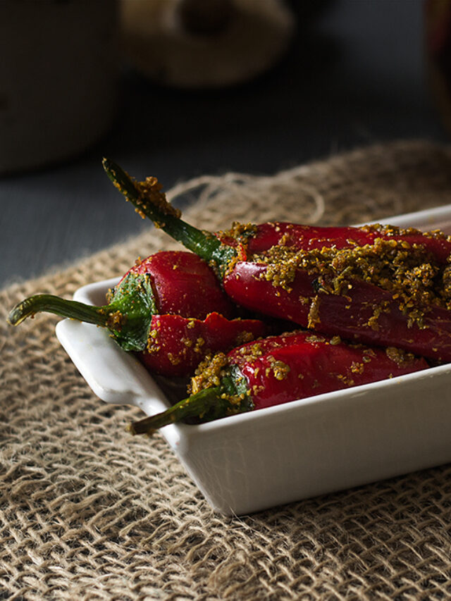 Top view of Bharwan Lal Mirch ka Achar, displaying the stuffed red chilies