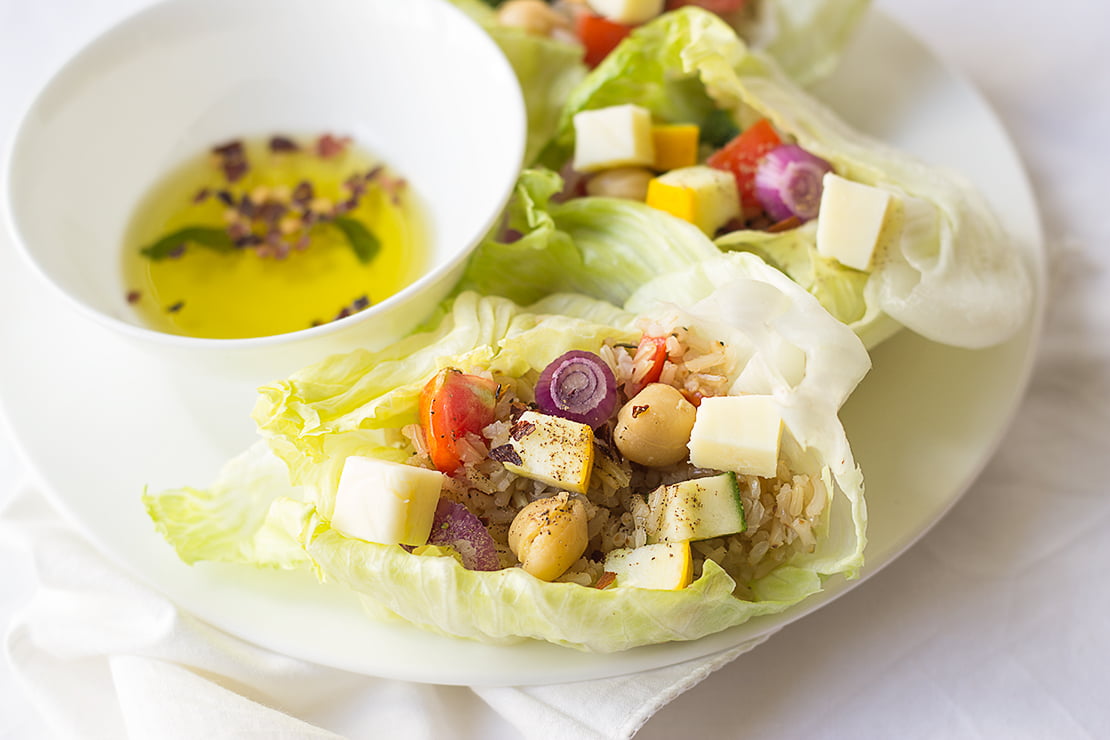 Brown rice lettuce wraps arranged beautifully on a plate