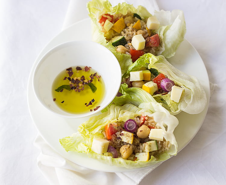 Fresh lettuce leaves with vegetarian brown rice stuffing