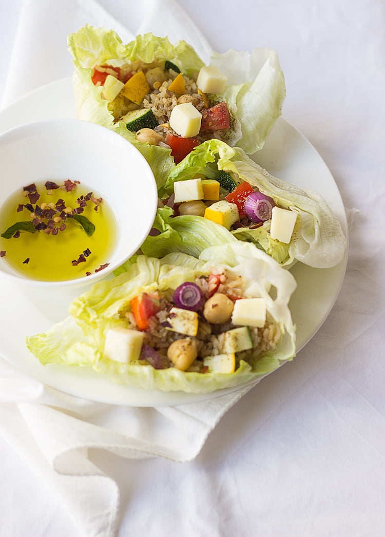 Brown rice lettuce wraps arranged beautifully on a plate