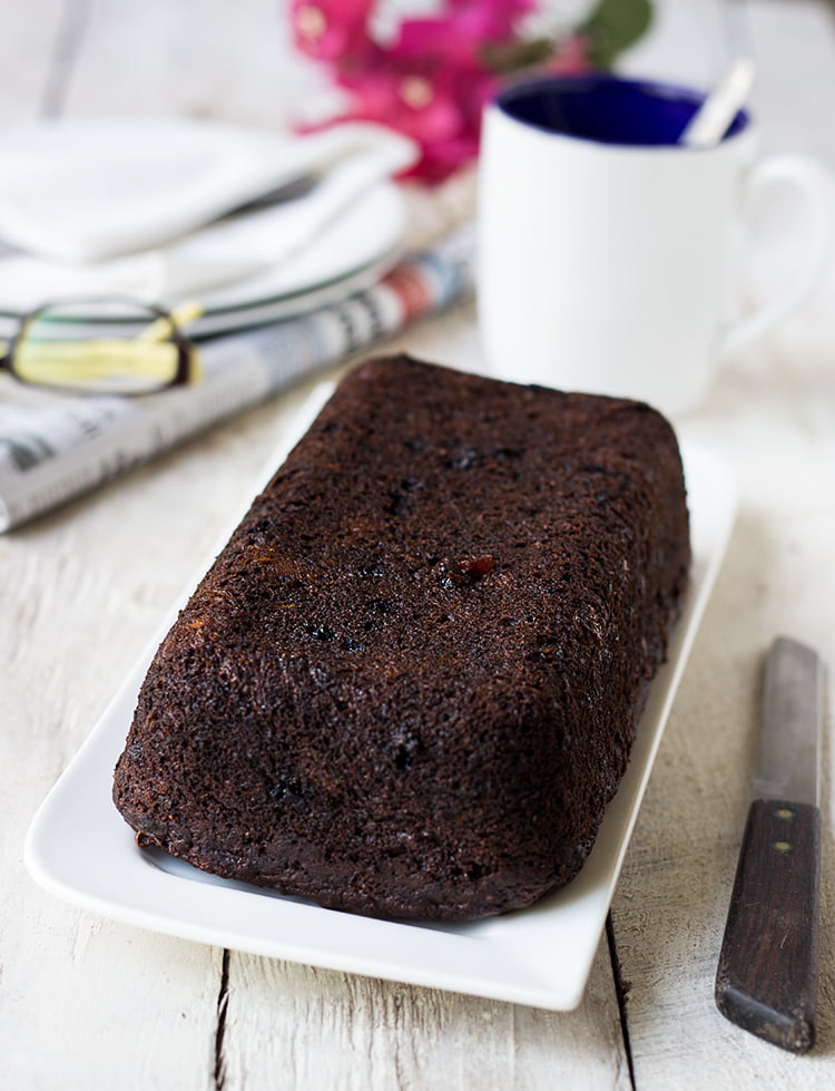 Whole loaf of double chocolate zucchini bread with chocolate chips on top