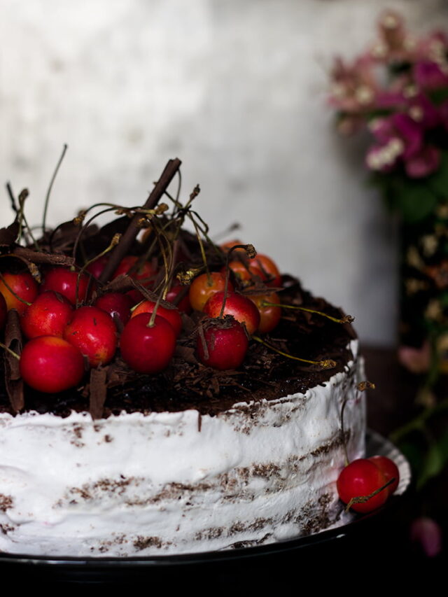 Close-up of the layers inside an eggless black forest cake showing rich chocolate and cream