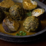 Paneer spinach kofta curry served in a bowl