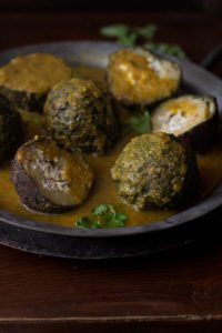 Paneer spinach kofta curry served in a bowl
