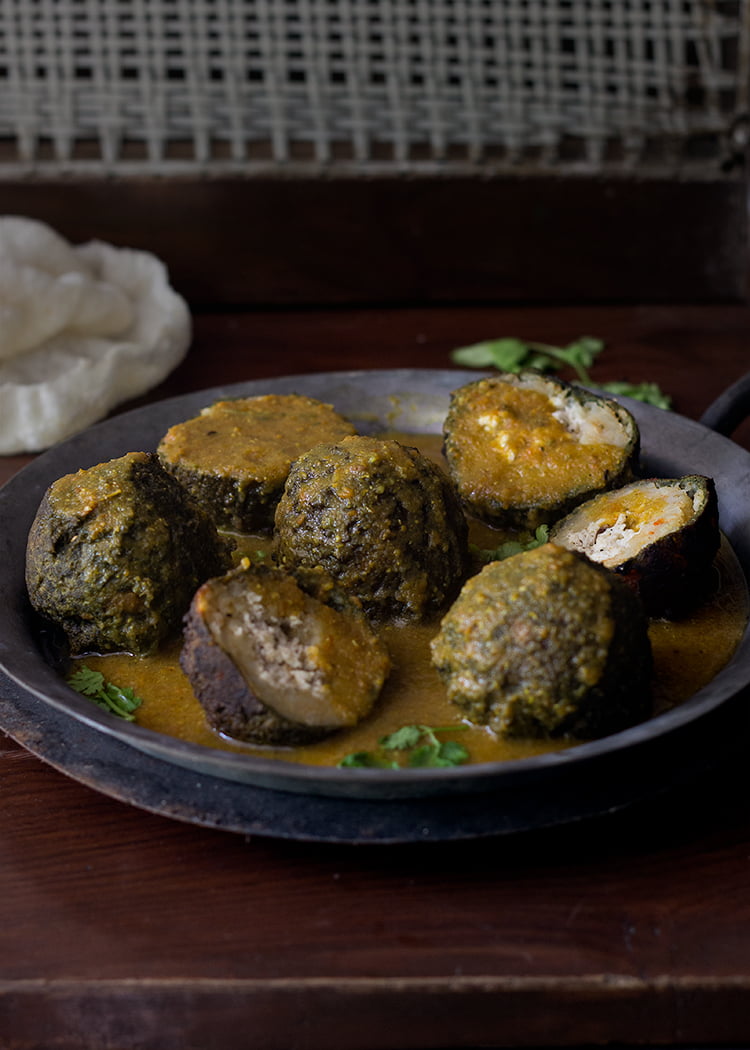 Paneer spinach kofta curry served in a bowl