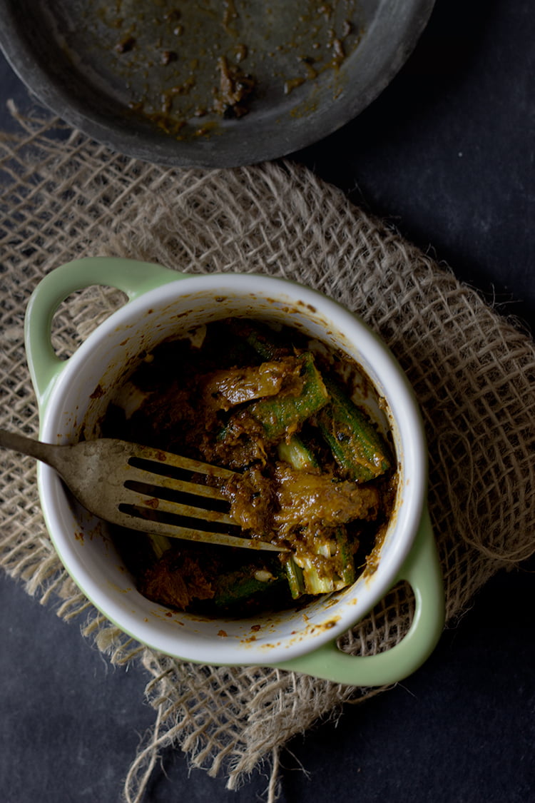 Close-up of pickled okra pieces showing texture and spice infusion