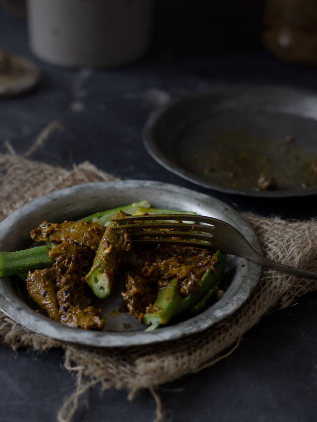 Close-up of pickled okra pieces showing texture and spice infusion