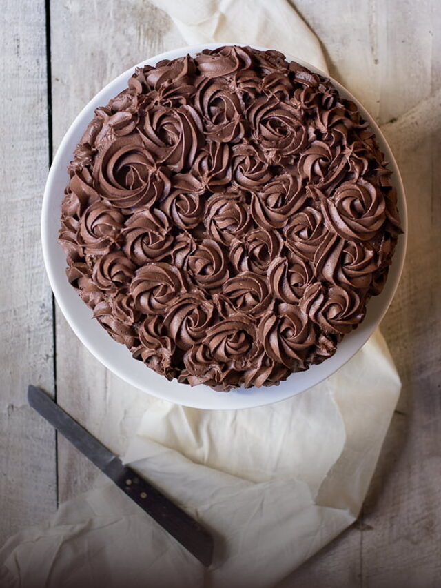 Tiramisu Chocolate Cake topped with a layer of chocolate ganache