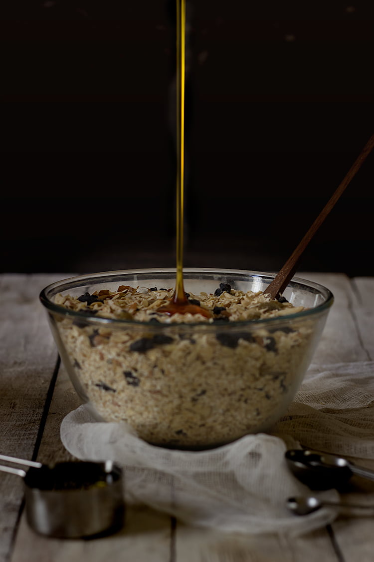 A bowl of crunchy homemade granola with nuts and dried fruits