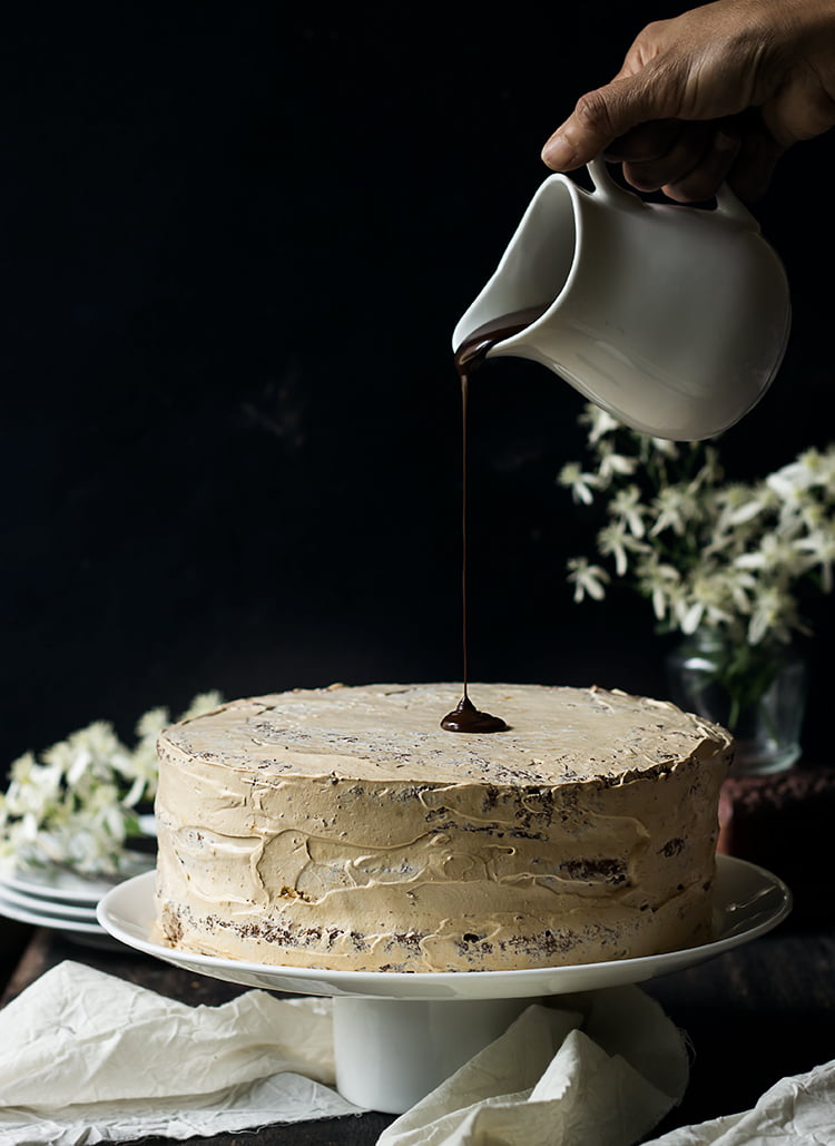 Decorative Eggless Chocolate Mocha Cake with chocolate chips and mocha frosting
