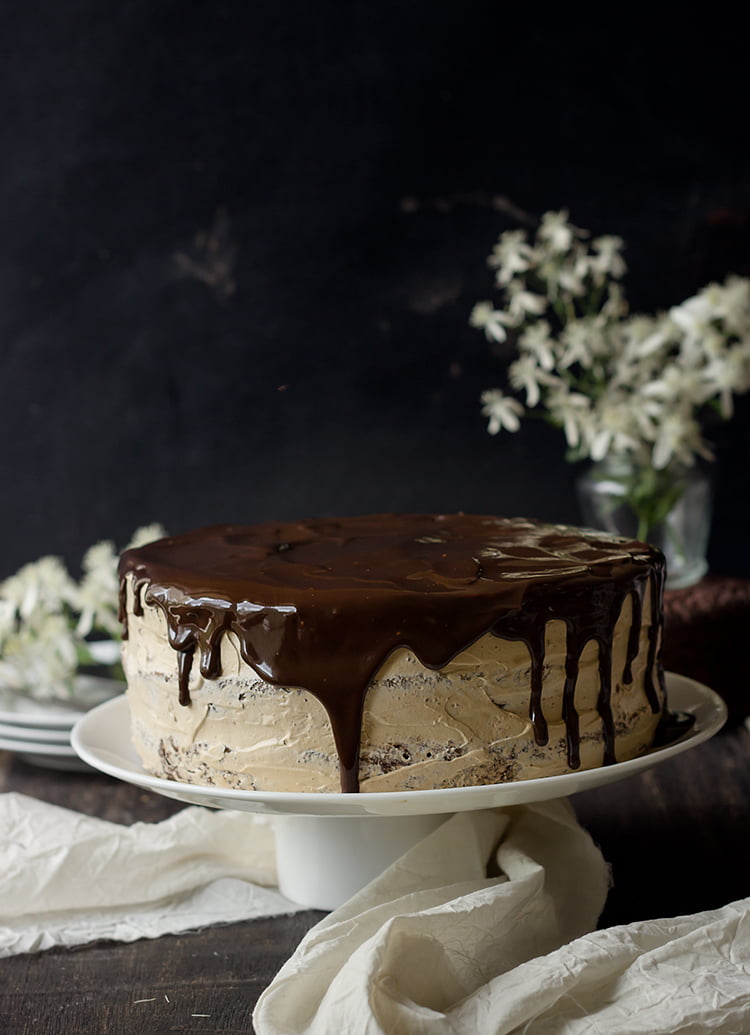 Eggless Chocolate Mocha Cake on a cake stand, ready for serving
